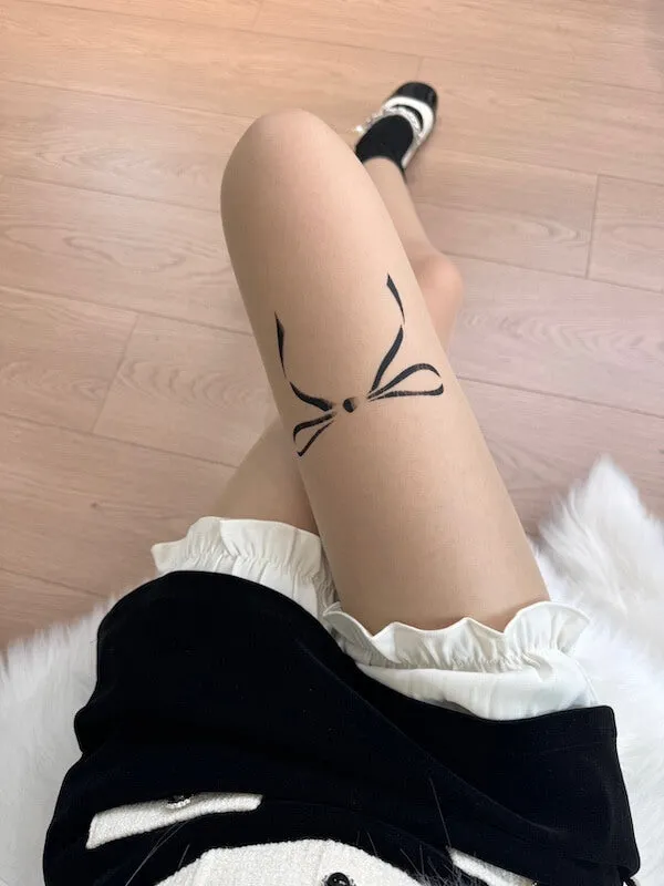 Doll bow tattoo tights