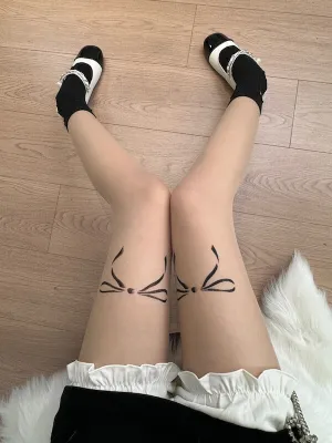 Doll bow tattoo tights