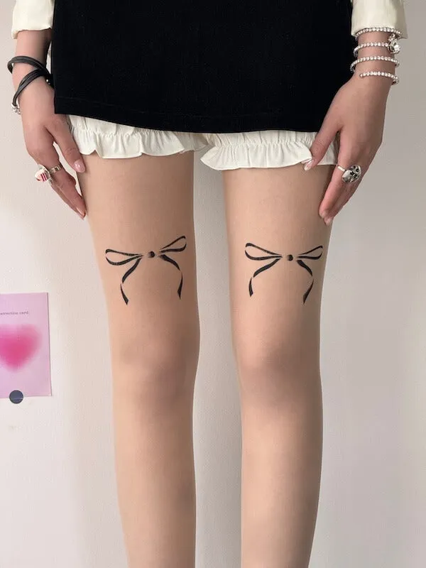 Doll bow tattoo tights